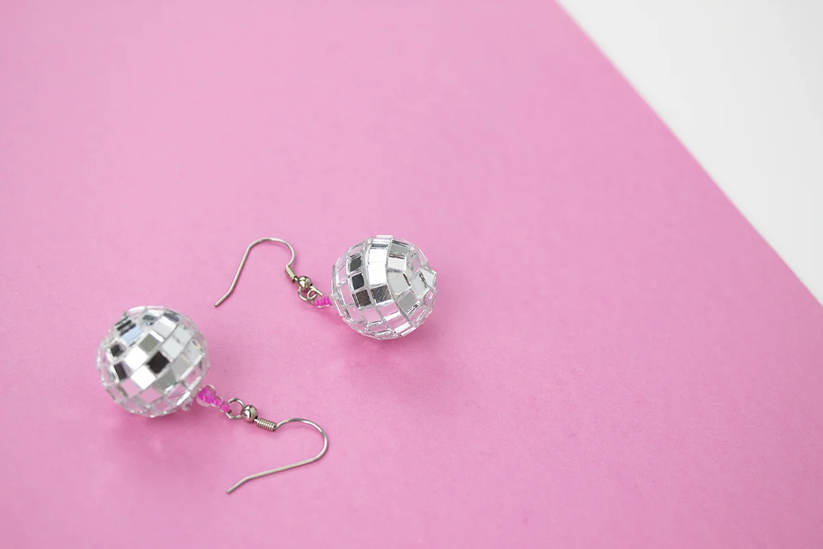 You can wear these earrings anytime there's a party- or anytime you want to party. They're super easy to make and lightweight. Check out the DIY now!