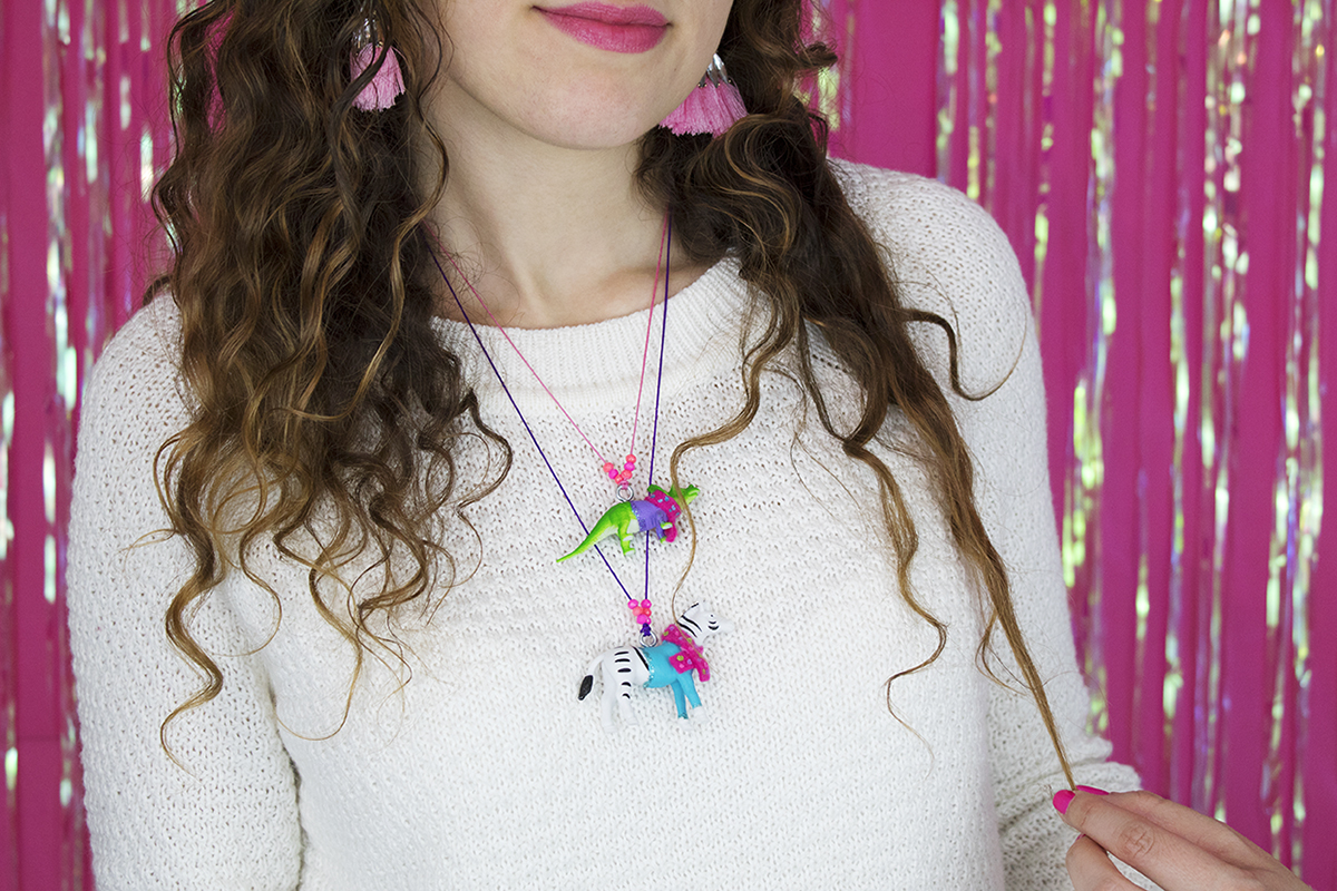 These animals in sweaters are so cute that everyone wants them! They would make a great gift for a winter or animal/dinosaur-themed party, or even as party favors! Click for the DIY. #diyjewelry #handmadejewelry #diygifts