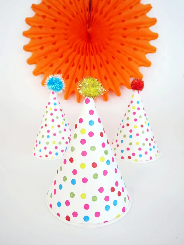 This isn't a regular hat- it's a cool hat! They're cheap and easy to make, and make really cute festive accessories. Click to check out the easy how-to!