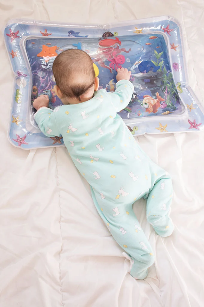 Make tummy time more fun for baby with this water toy! It’s a great baby shower gift idea and perfect for playing with baby. Click to learn more about this baby list must-have item! #tummytime #tummytimeproducts #bestbabyproducts