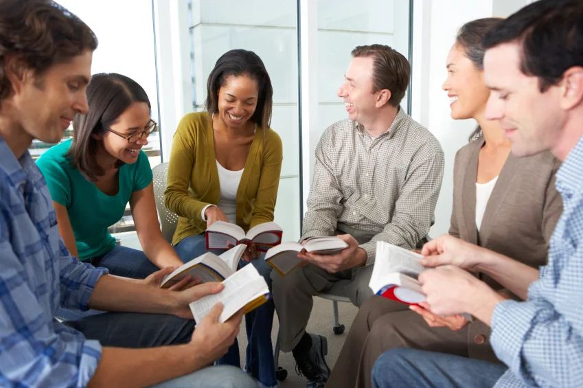 Bible-group-reading-together-in-a-close-circle-000024896791_Small.jpg
