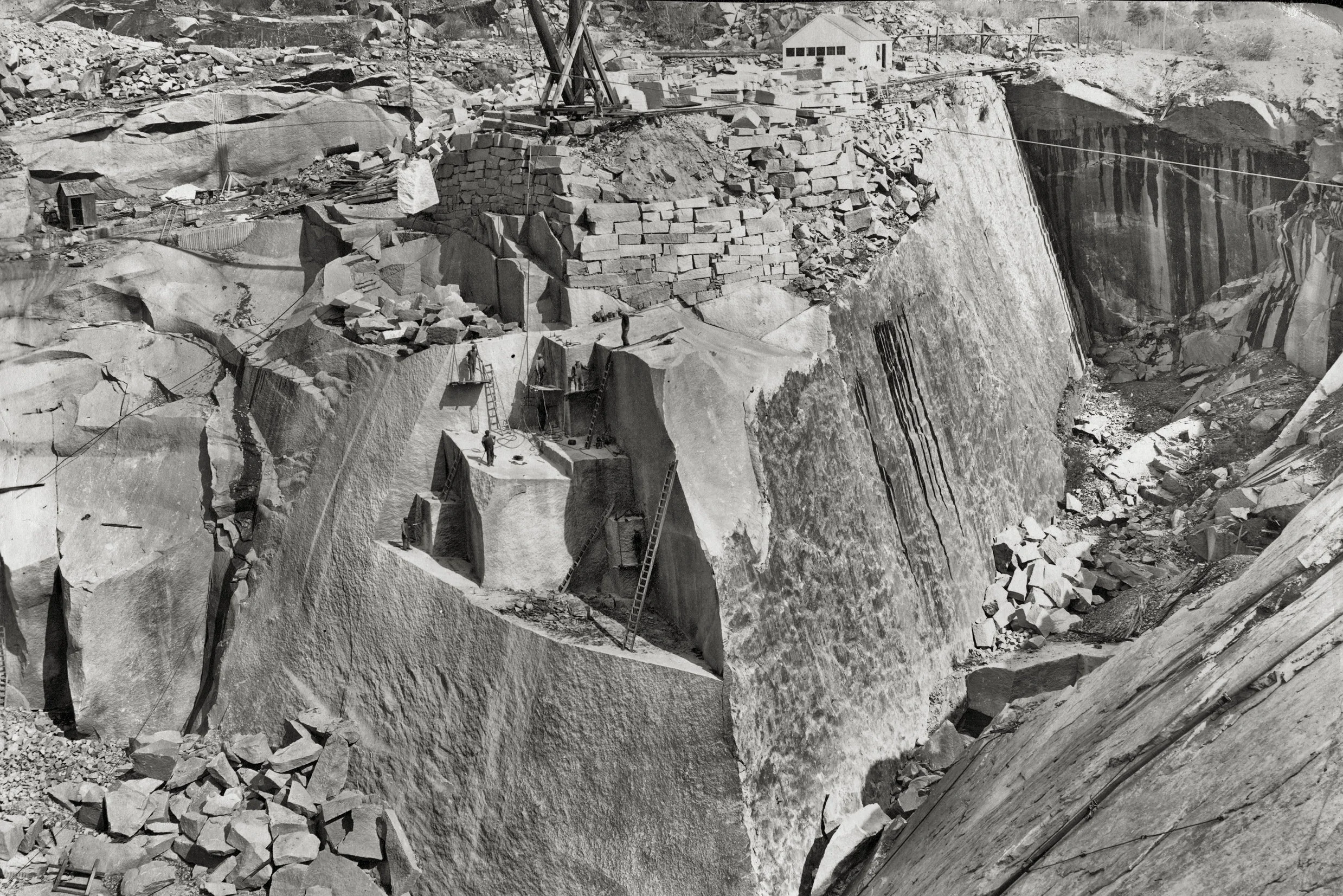 Our sincere gratitude and thanks go to the Cape Ann Museum and Sandy Bay Historical Society for allowing us to reproduce the historical photographs depicting the Cape Ann quarrying industry. All of the images you see on the walls of our restaurant are from their archives. We also want to thank Leslie Bartlett for sharing his invaluable historical knowledge on Rockport’s granite quarries and his technical expertise in reproducing the images.