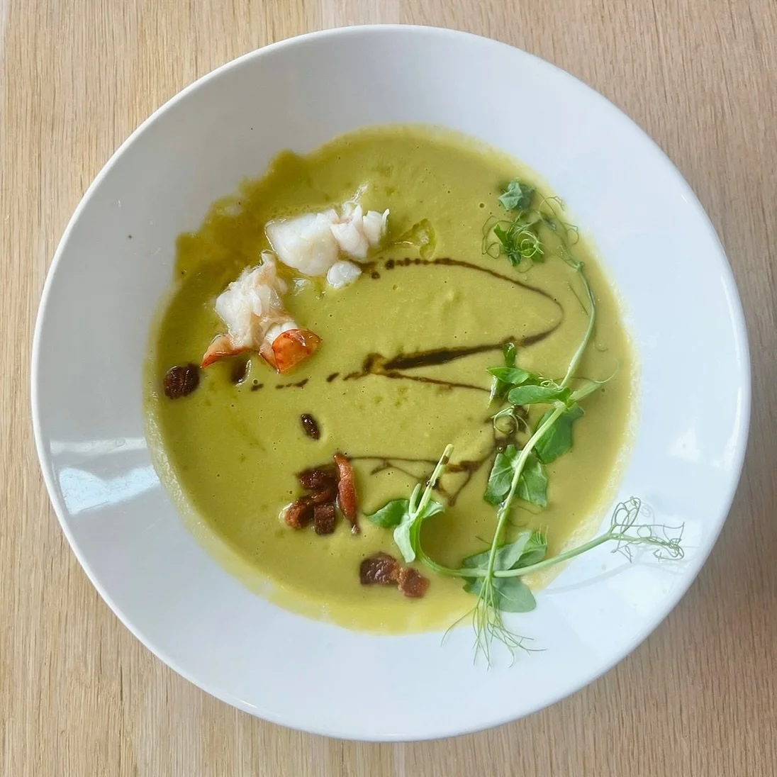 Soup just hits different on rainy days 🌧️

Come try our pea soup with butter poached lobster🦞🤤
&bull;
&bull;
&bull;
&bull;
#featherandwedge #newengland #restaurant #rockportma #capeannma #northshorema #oceanviews #restaurantbythesea #peasoup #butt