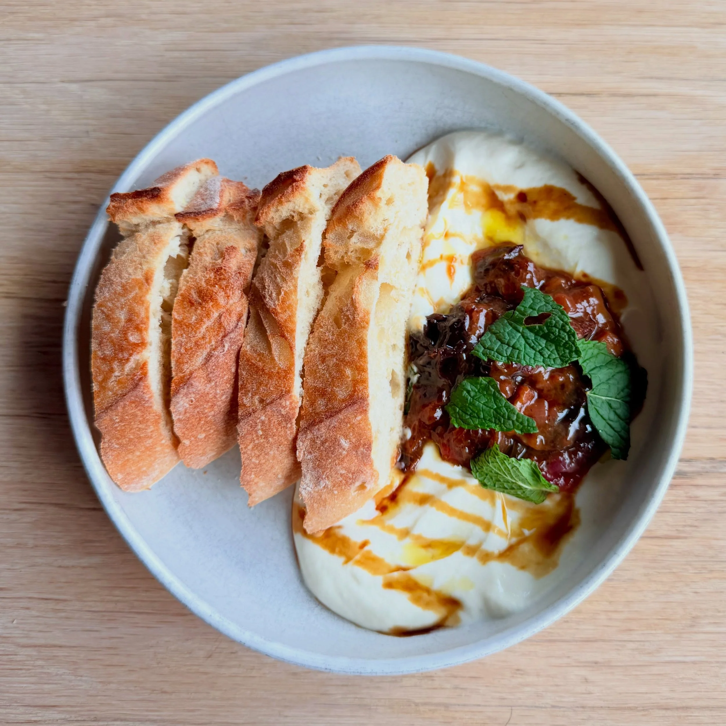 It&rsquo;s strawberry rhubarb season🍓

Come try our two new dishes!

&hearts;️Whipped ricotta with a rhubarb compote 
and
&hearts;️Strawberry rhubarb crisp with vanilla ice cream