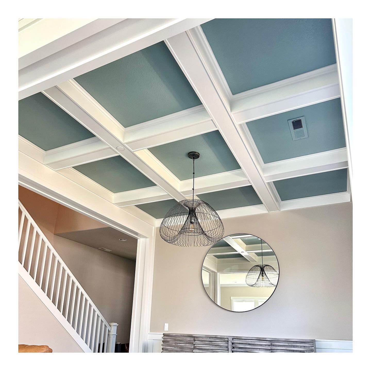 I really dig unexpected color placement, like here in the box beams. 
We kept it neutral on the main floor of this home except for this green-gray-blue, resulting in a palette that gives the new homeowners lots of flexibility when choosing furnishing