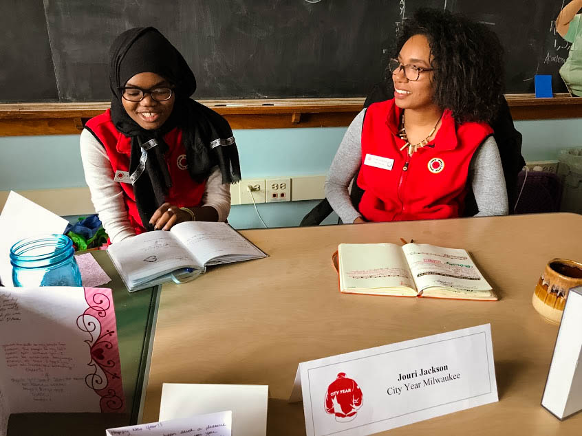   1pm Impact Manager Check In: Providing professional development to corps members is a priority for City Year. Every week corps members meet with their Impact Manager to receive support and feedback about attaining their personal and professional go