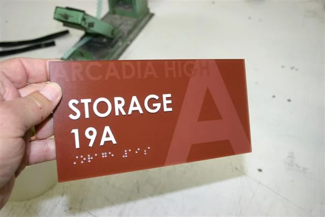 Braille sign with subsurface graphics 8 x 5 school.JPG