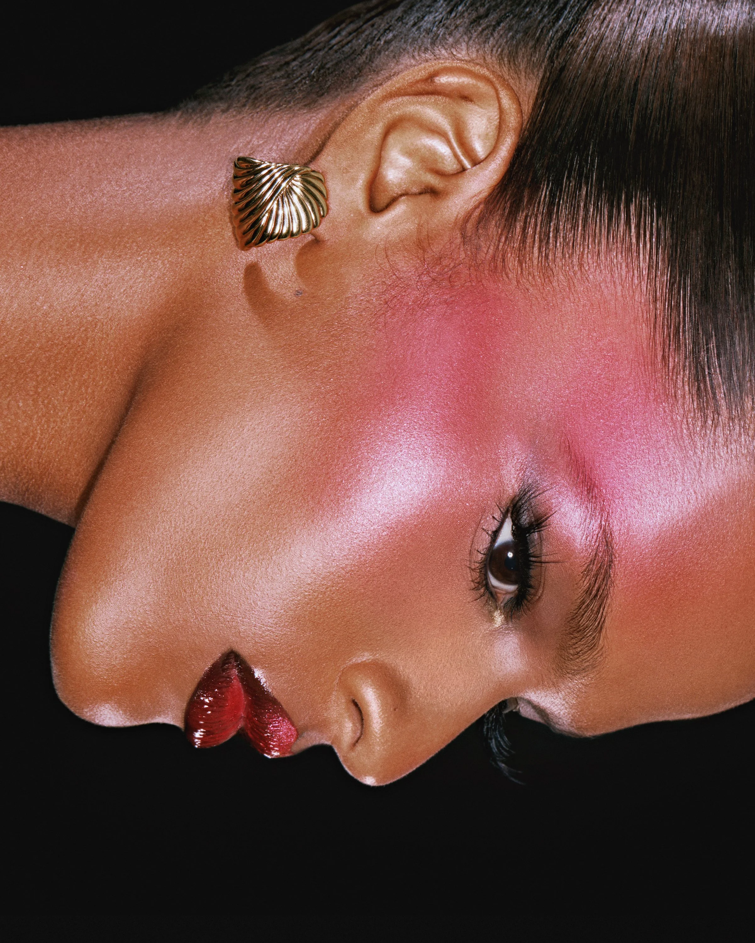 New York beauty photographer photoshoot makeup photography Top cosmetic photographers Model with pink blush red lipstick earrings and lashes Los Angeles campaign