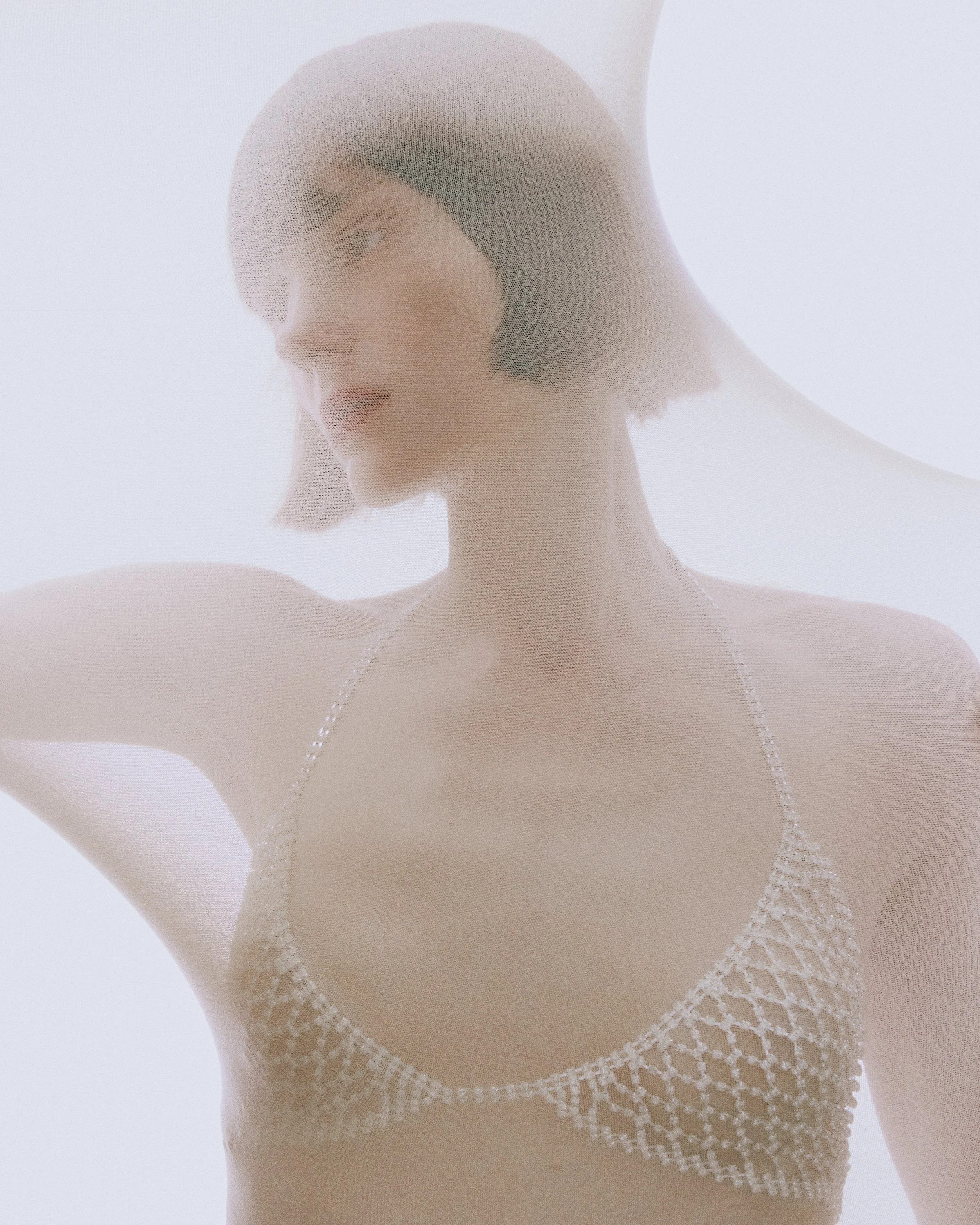  New York and Los Angeles beauty photographer photoshoot makeup photography. Top cosmetic photographers. Model with pale skin mesh Nora 