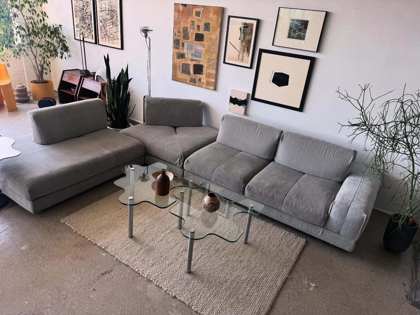 This Italian sectional came in this week. Fun part about it is the backrests flip forward and back to create a deeper seat area. It&rsquo;s comfy!