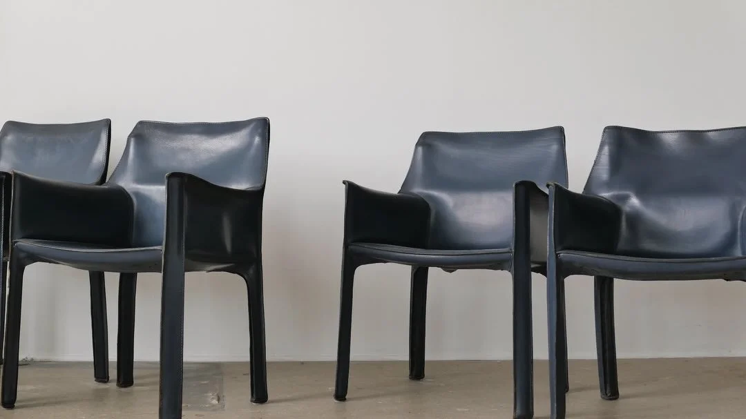 Set of 8 Bellini CAB chairs in rare and custom blue leather. Yup! You won&rsquo;t find these anywhere. All in great condition and super comfortable.
