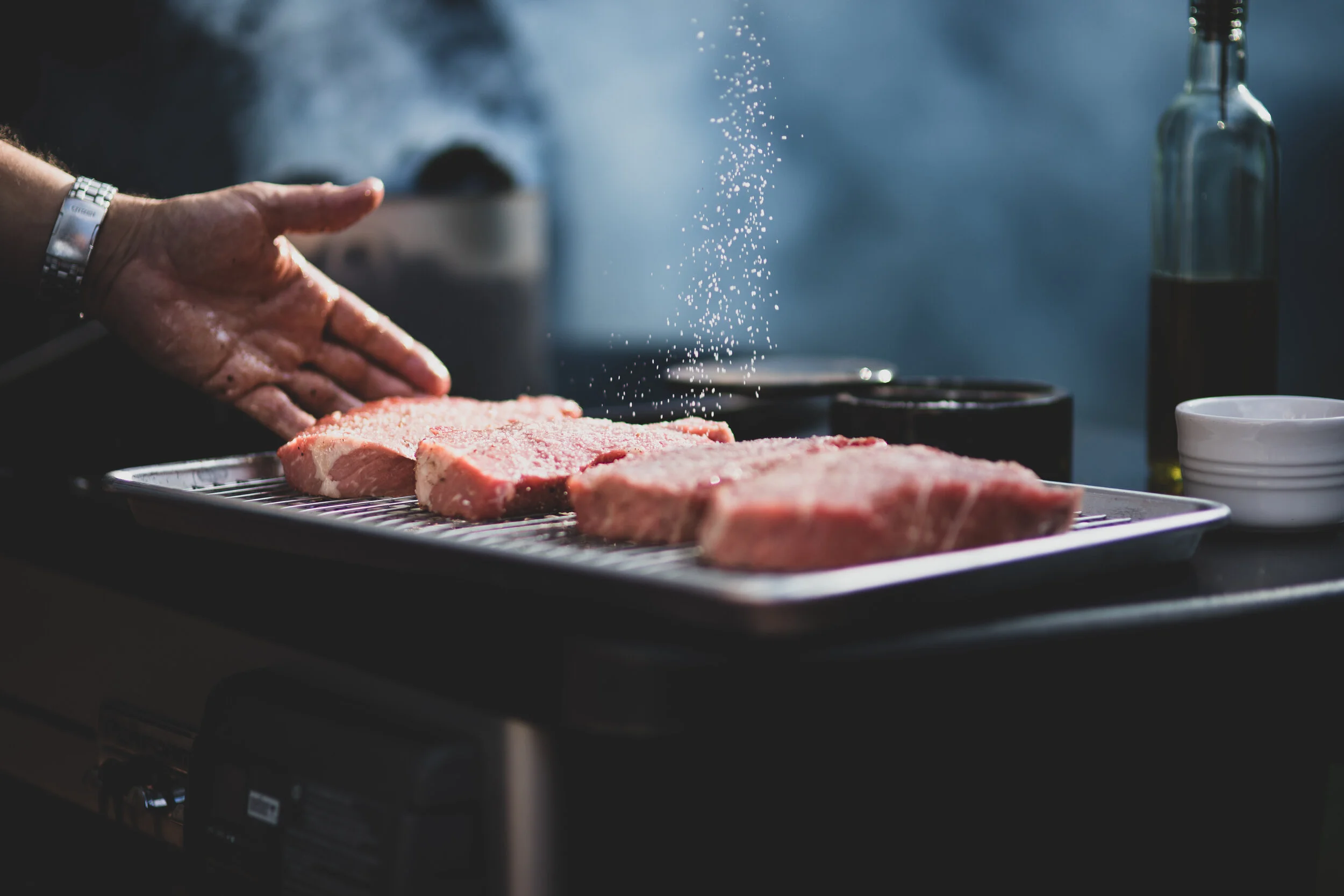Mike Lang grilling photo by Caroline Williams.jpg