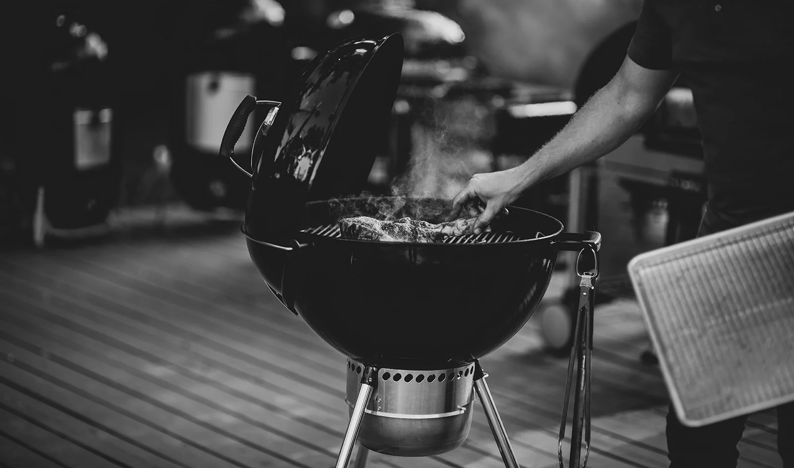 Mike Lang grilling photo by Caroline Williams.jpg