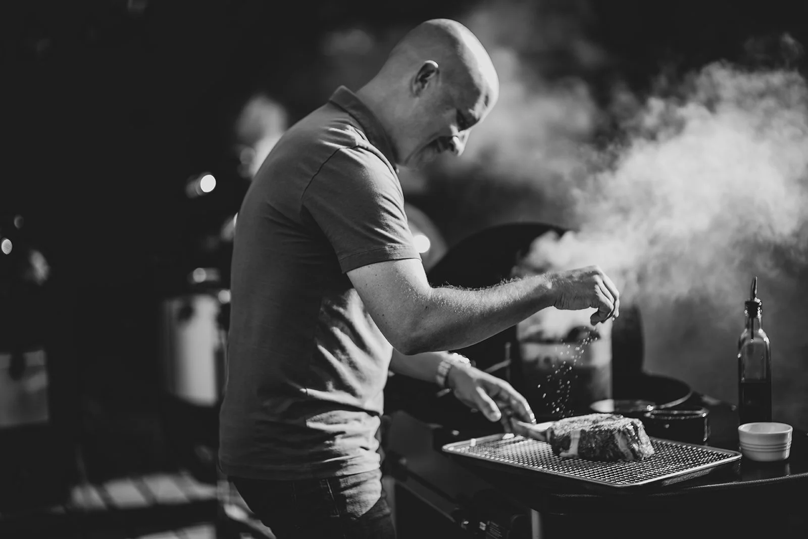 Mike Lang grilling photo by Caroline Williams.jpg