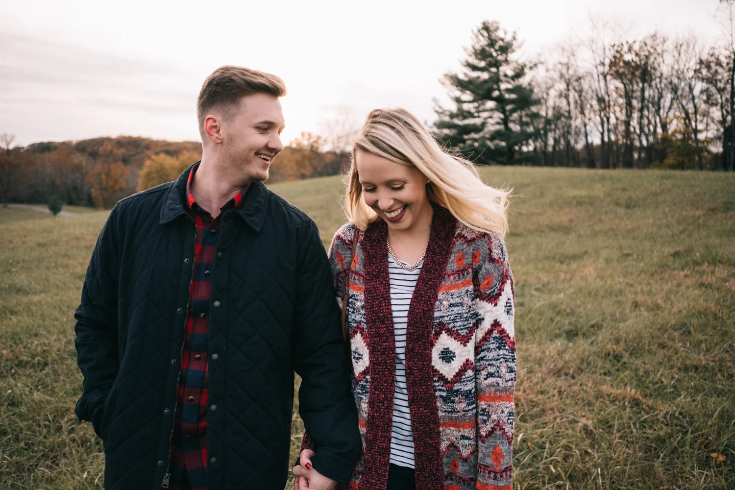 couple laughing and walking in morven park