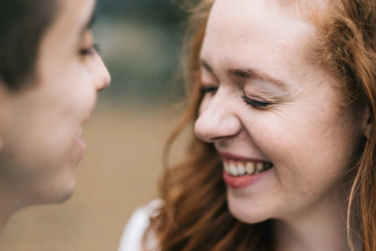 bride and groom portraits laughing