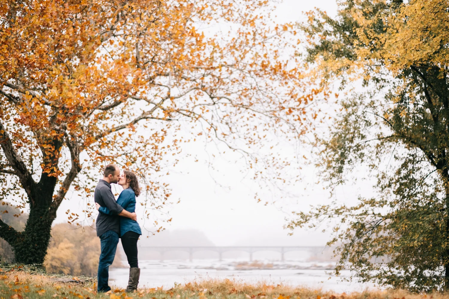 engagement picture looking out at the potomac river in harpers ferry