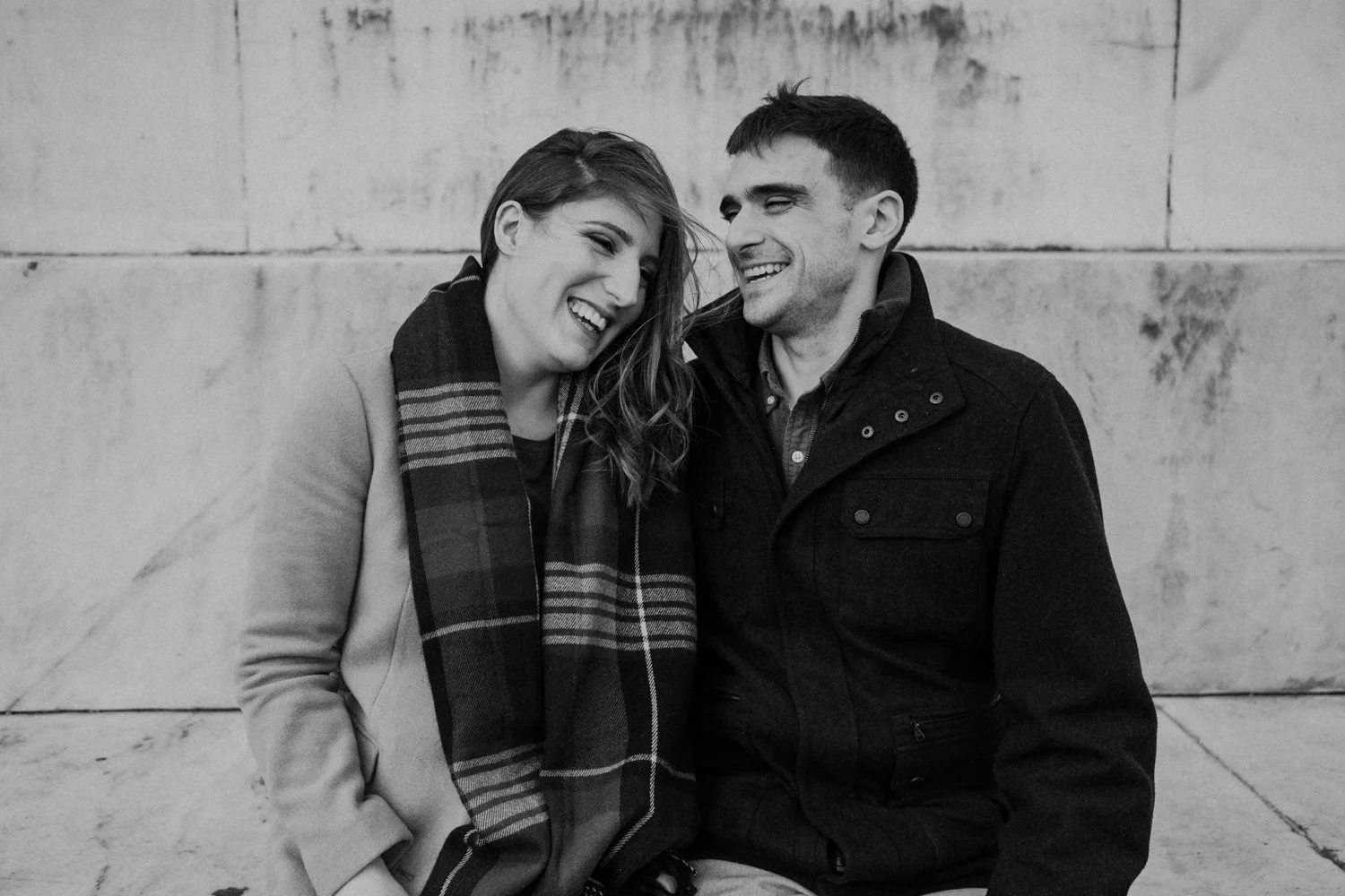 dc engagement couple laughing together lincoln memorial