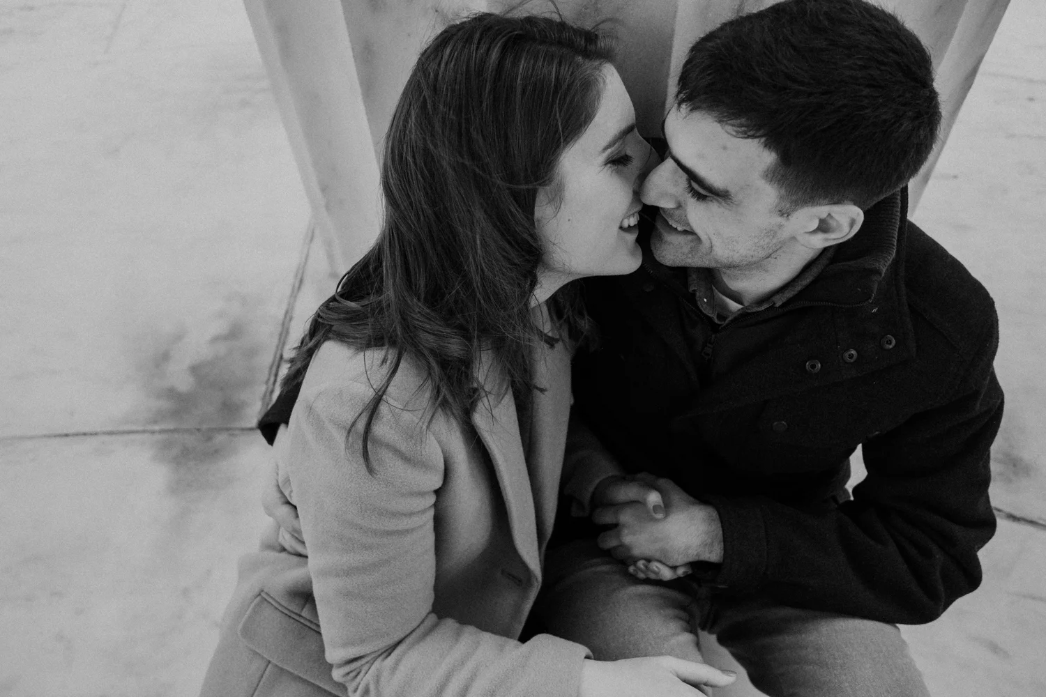 washington dc engaged couple kissing