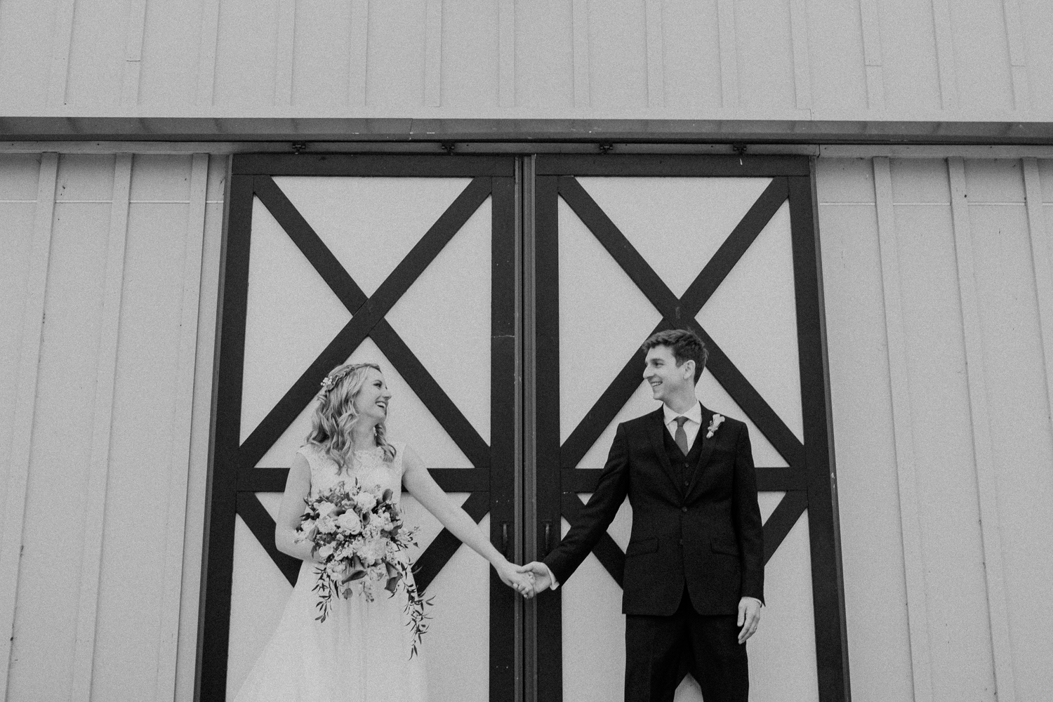 shadow creek barn doors wedding couple
