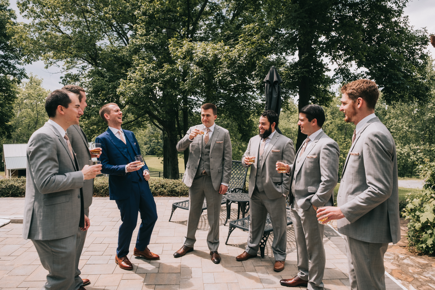 groomsmen getting ready bourbon and laughs