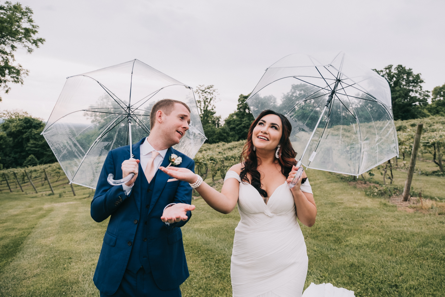 bluemont vineyard wedding rainy day umbrellas not a care in the world