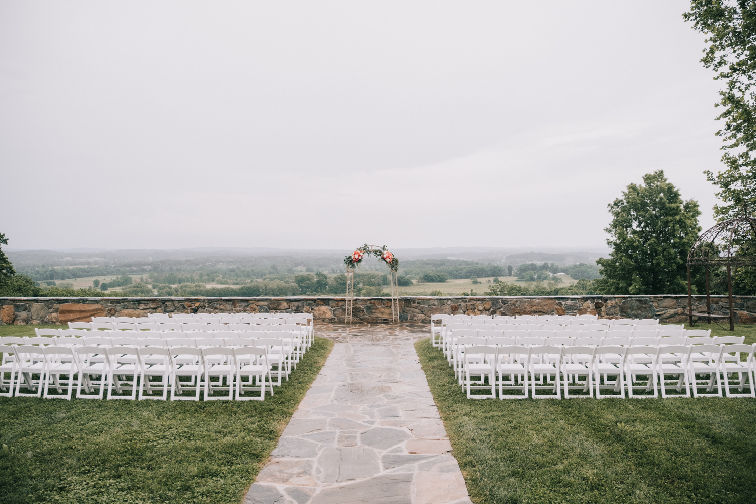 the stables at bluemont vineyard wedding setup on a rainy day