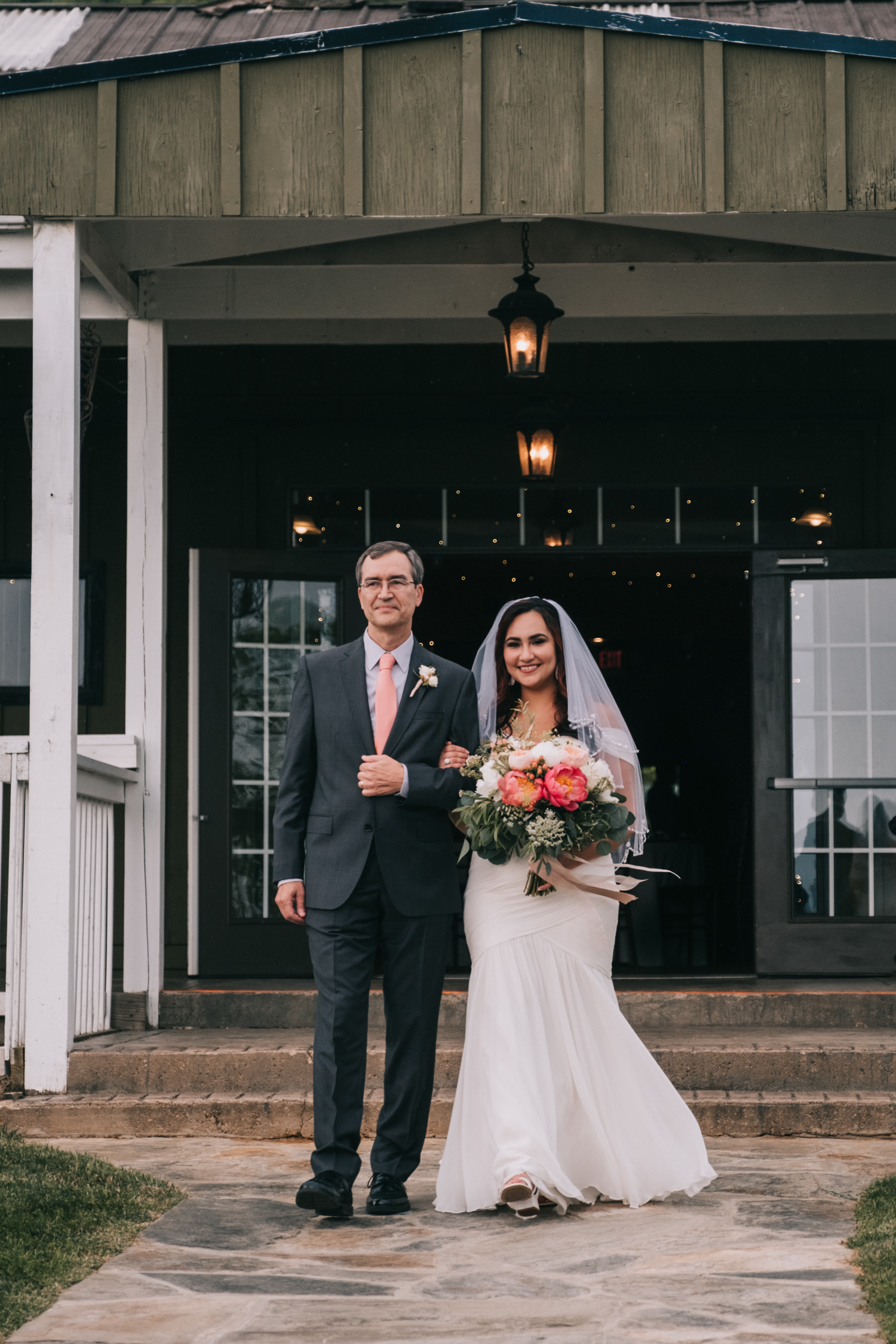 walking down the aisle at the stables at bluemont vineyard