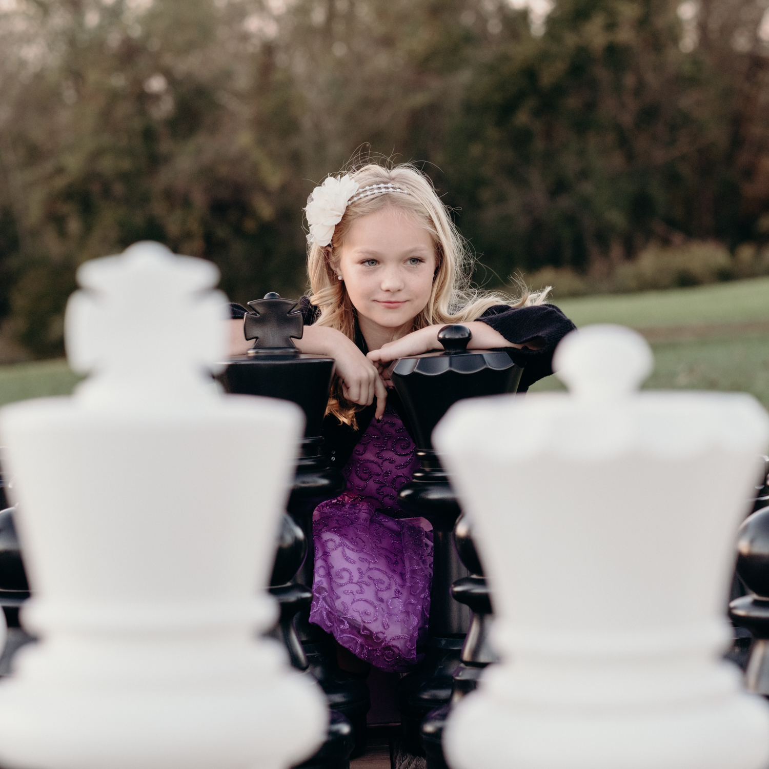 flower girl playing life size chess at middleburg wedding