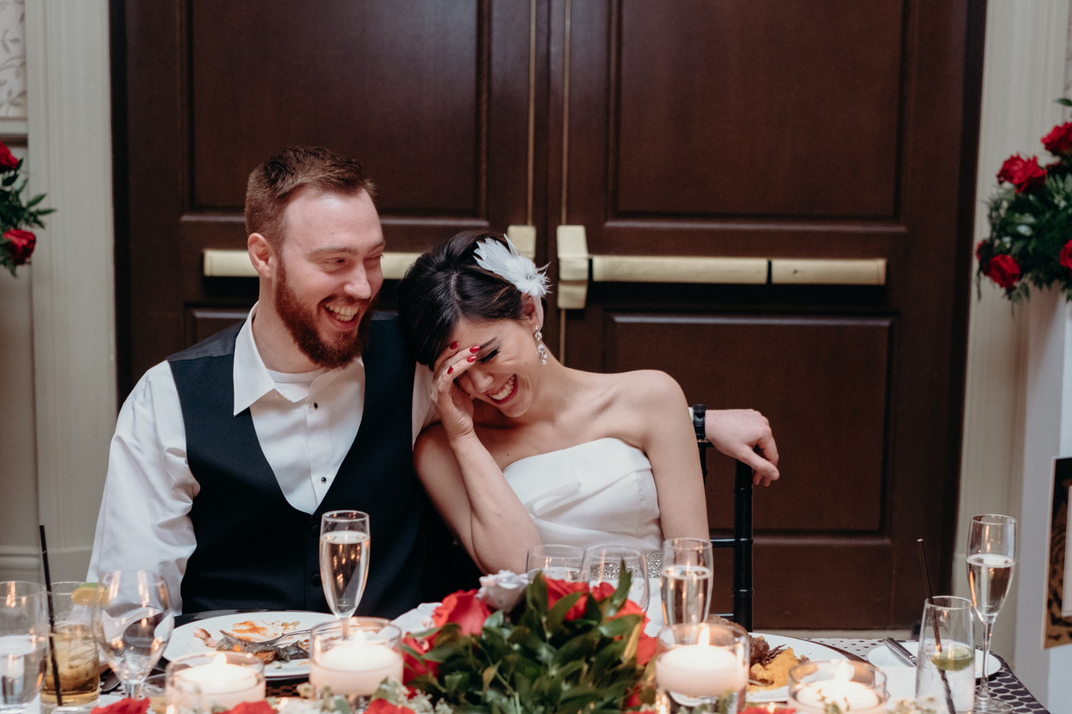 bride and groom laughing during toasts at middleburg wedding