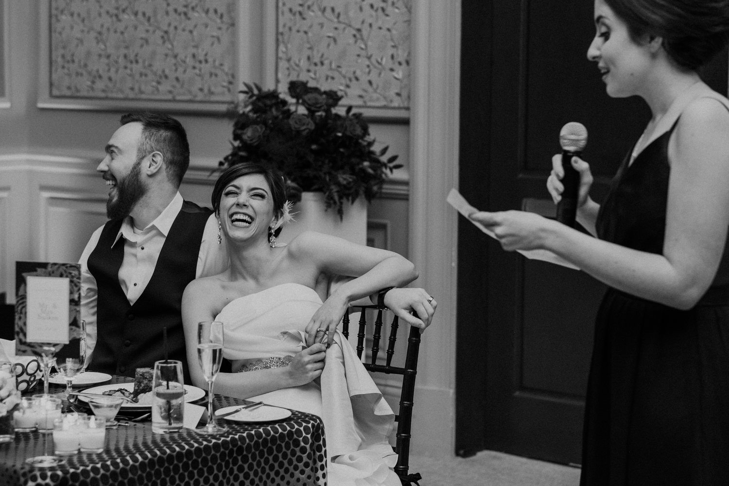 bride laughs during maid of honor toast at salamander resort wedding