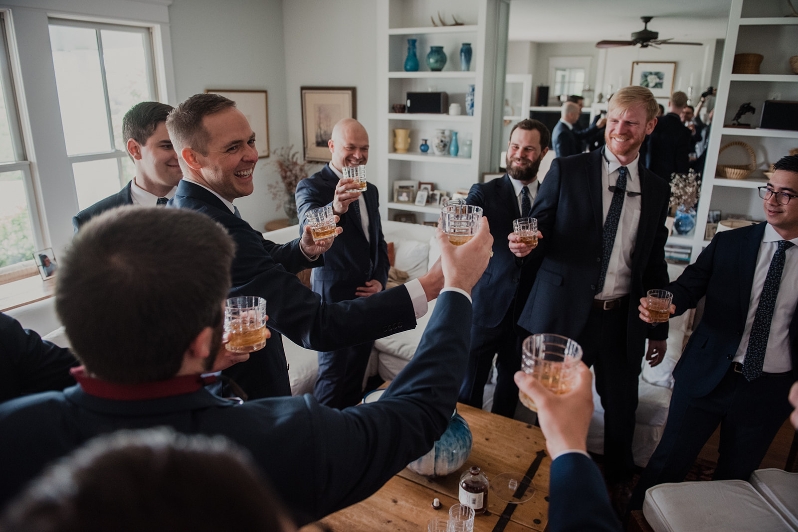 Groomsmen share a toast before the wedding ceremony at Blue Hill Farm in Waterford, VA. 