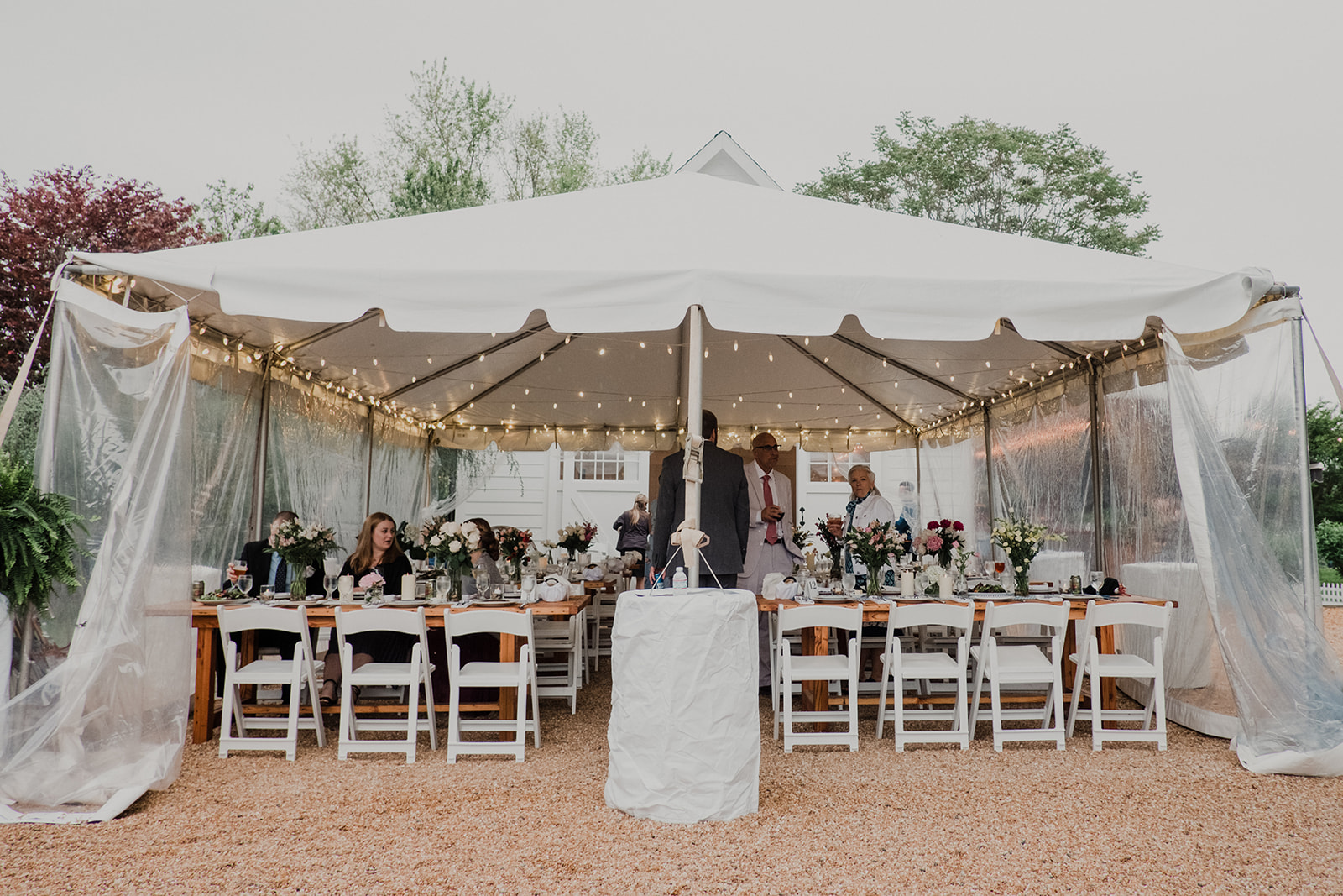 A tent is set up for a wedding reception at Blue Hill Farm in Waterford, VA.