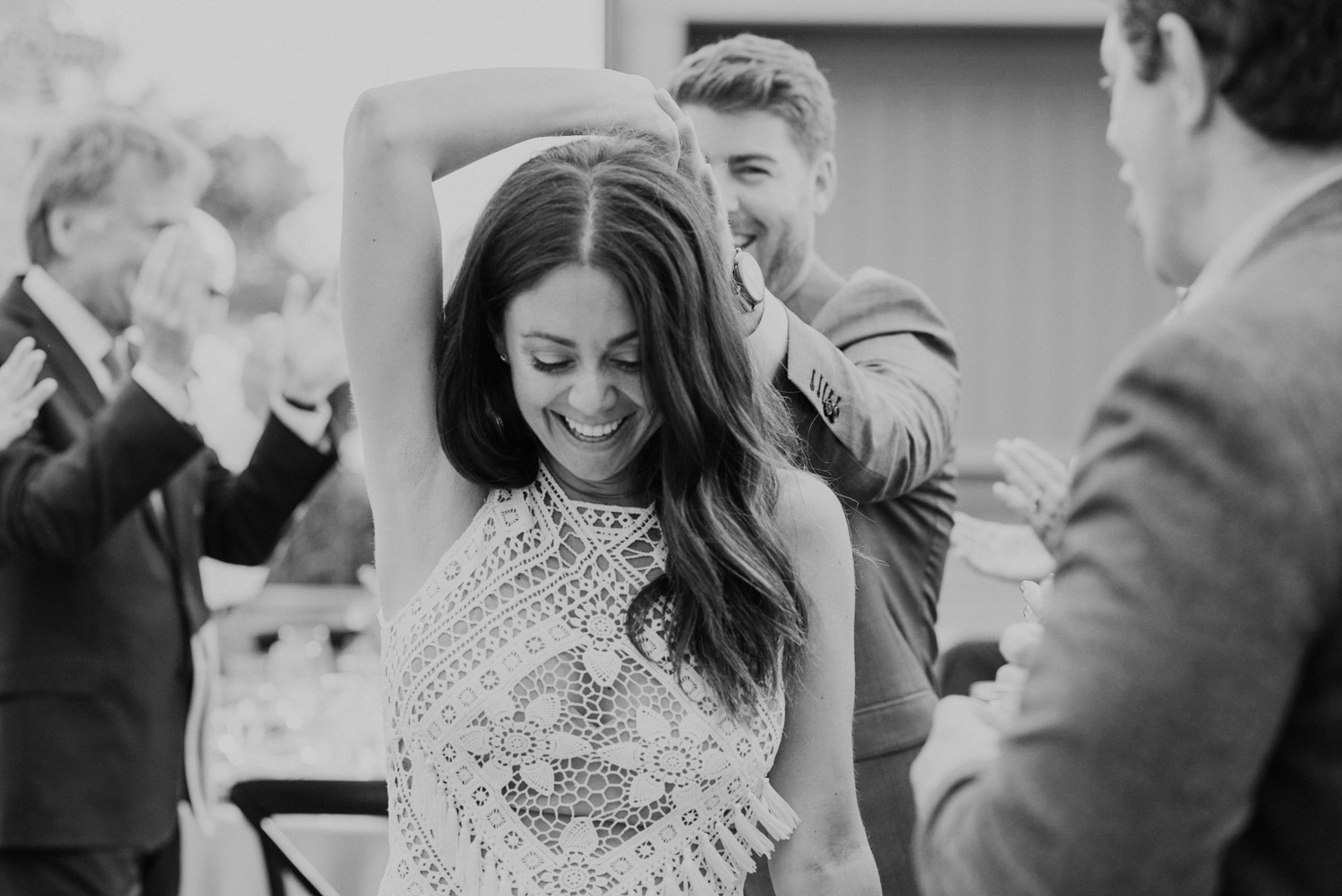 bride leads groom into reception during entrance