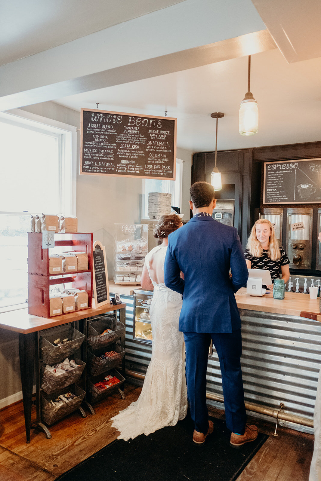 A bride and groom order coffee at King Street Coffee in Leesburg, VA.