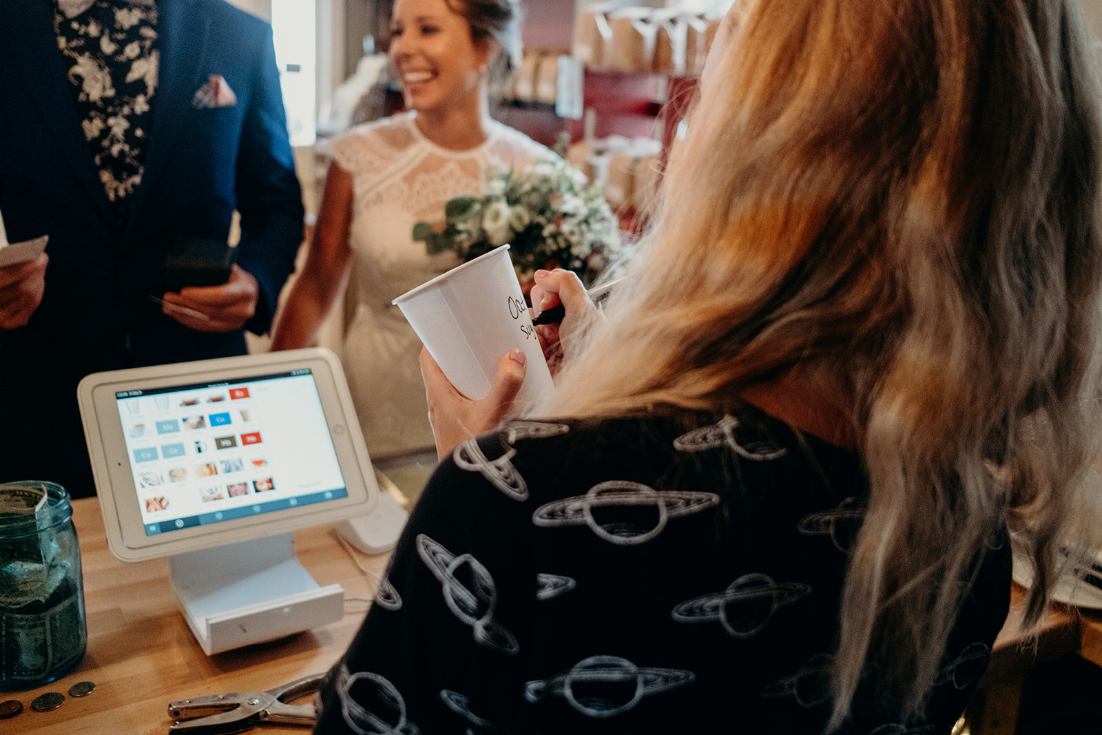 A bride places her order at King Street Coffee in Leesburg, VA. 