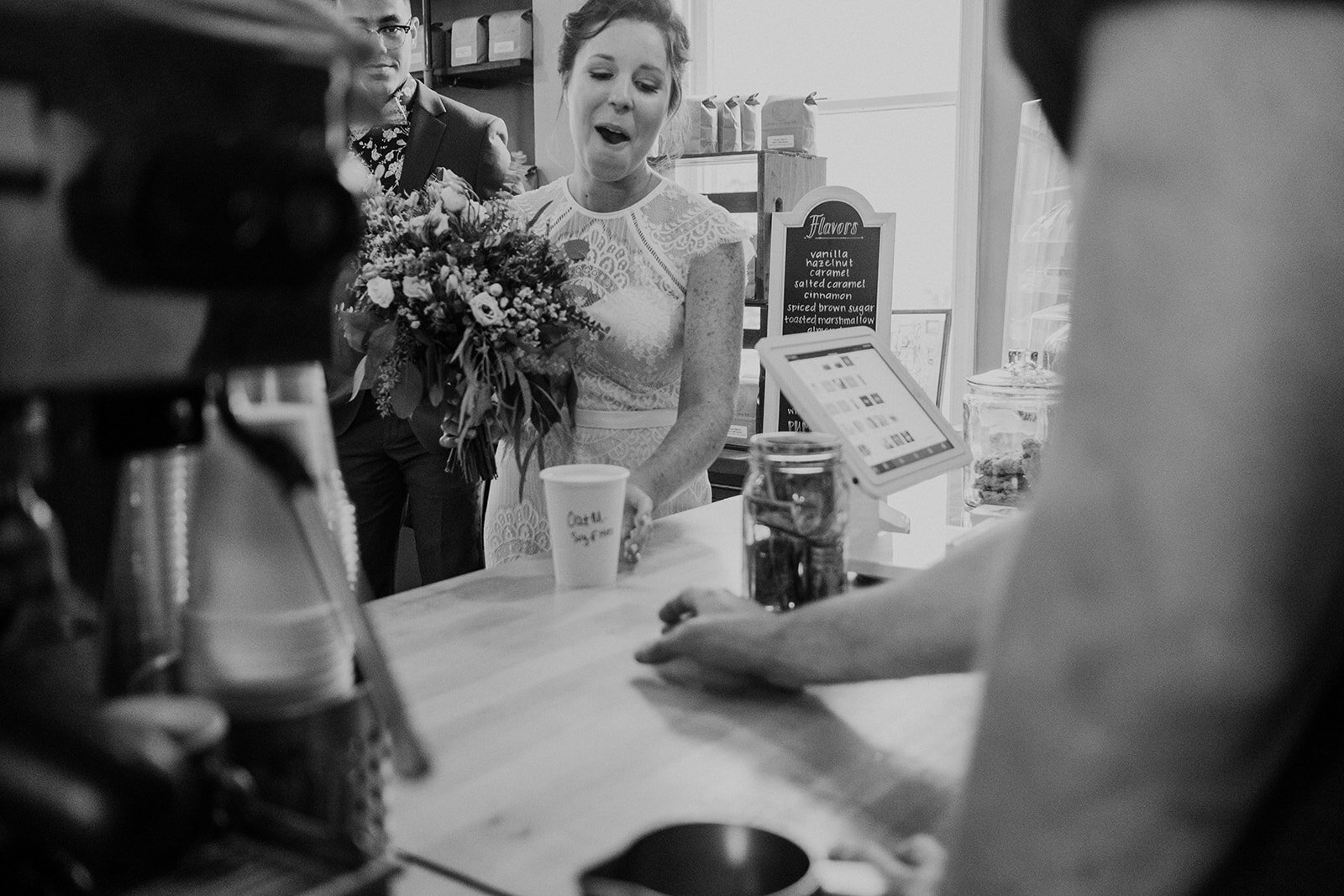 A bride admires her pretty latte from King Street Coffee in Leesburg, VA. 