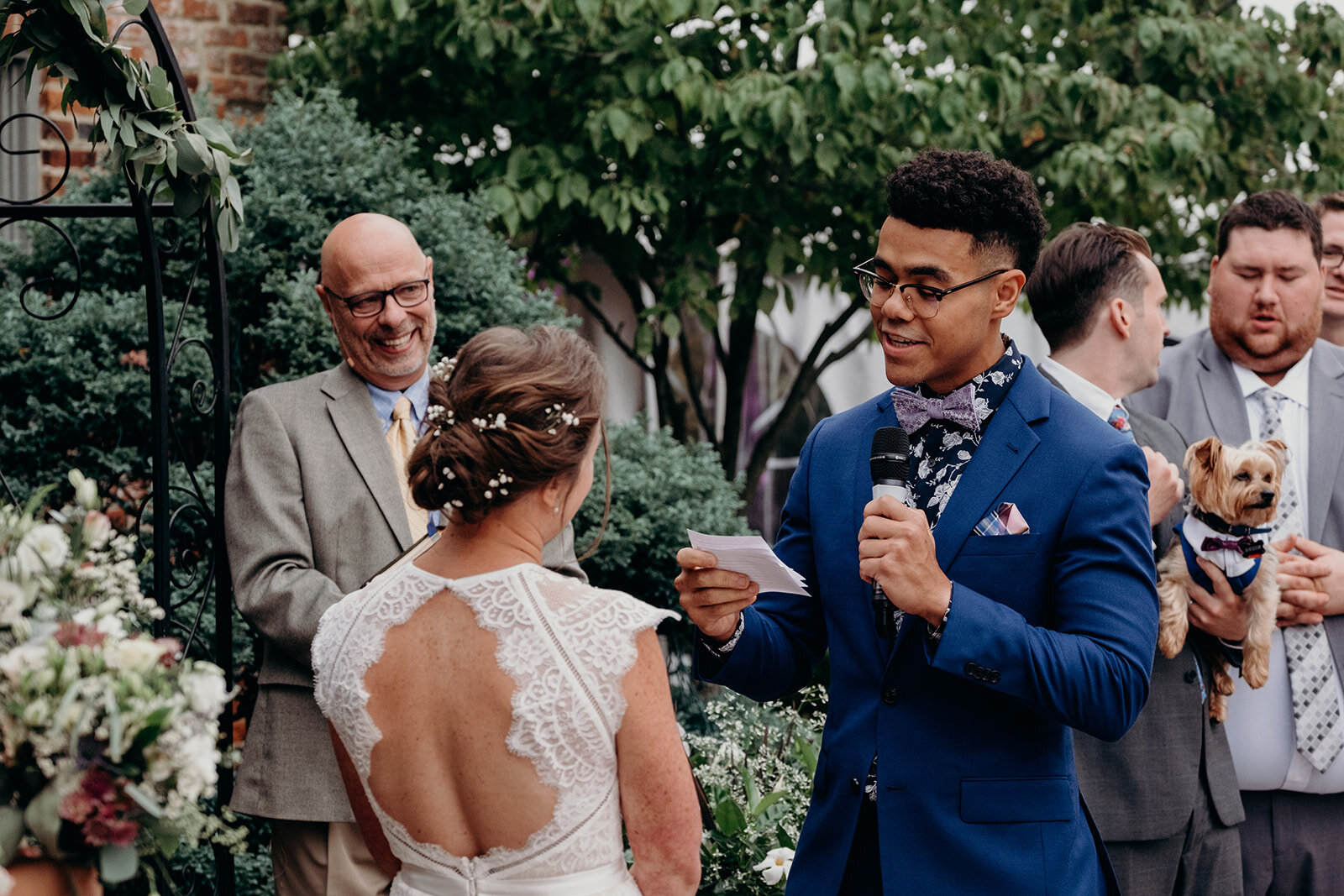 A groom says his vows during an outdoor wedding ceremony at Birkby House in Leesburg, VA. 