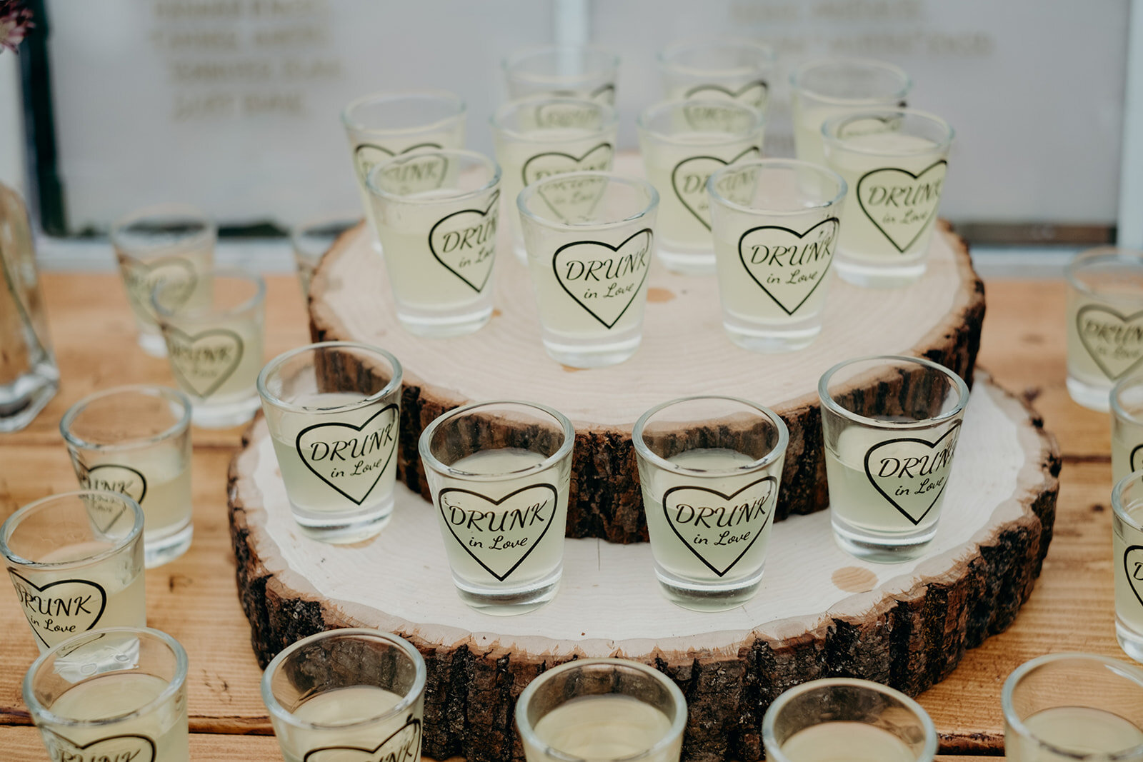 Limoncello shots in "Drunk In Love" shot glasses for guests of the tented wedding reception at Birkby House in Leesburg, VA.