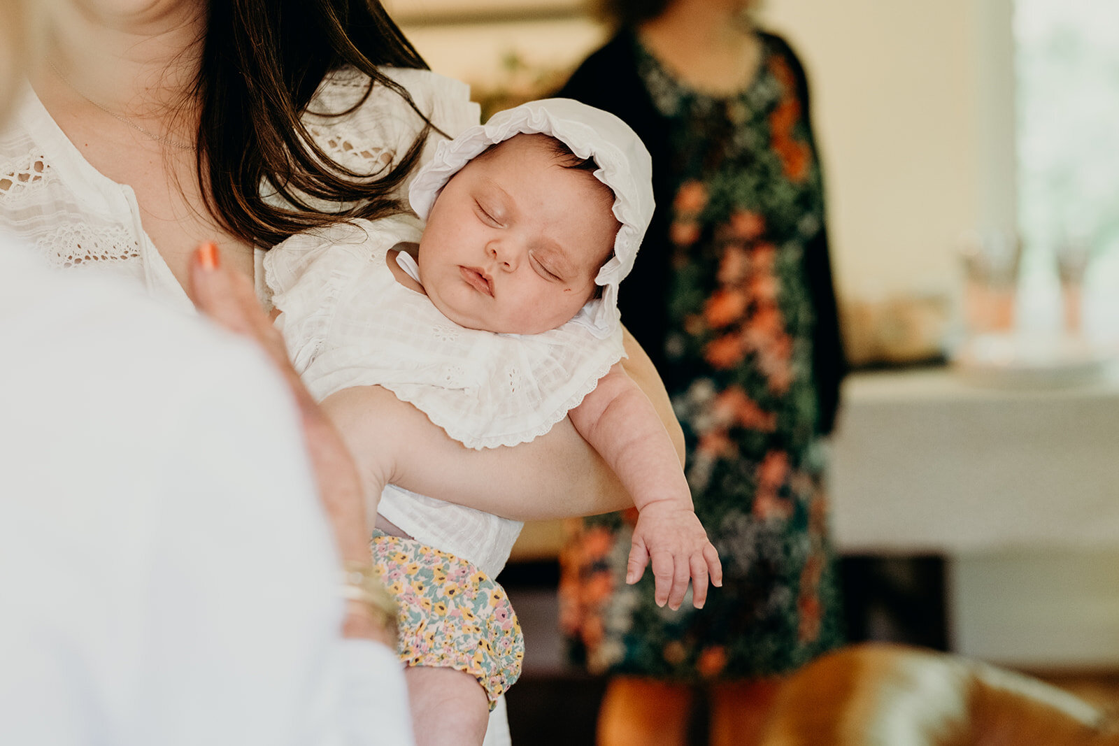 A baby girl falls asleep before the Jewish naming ceremony.