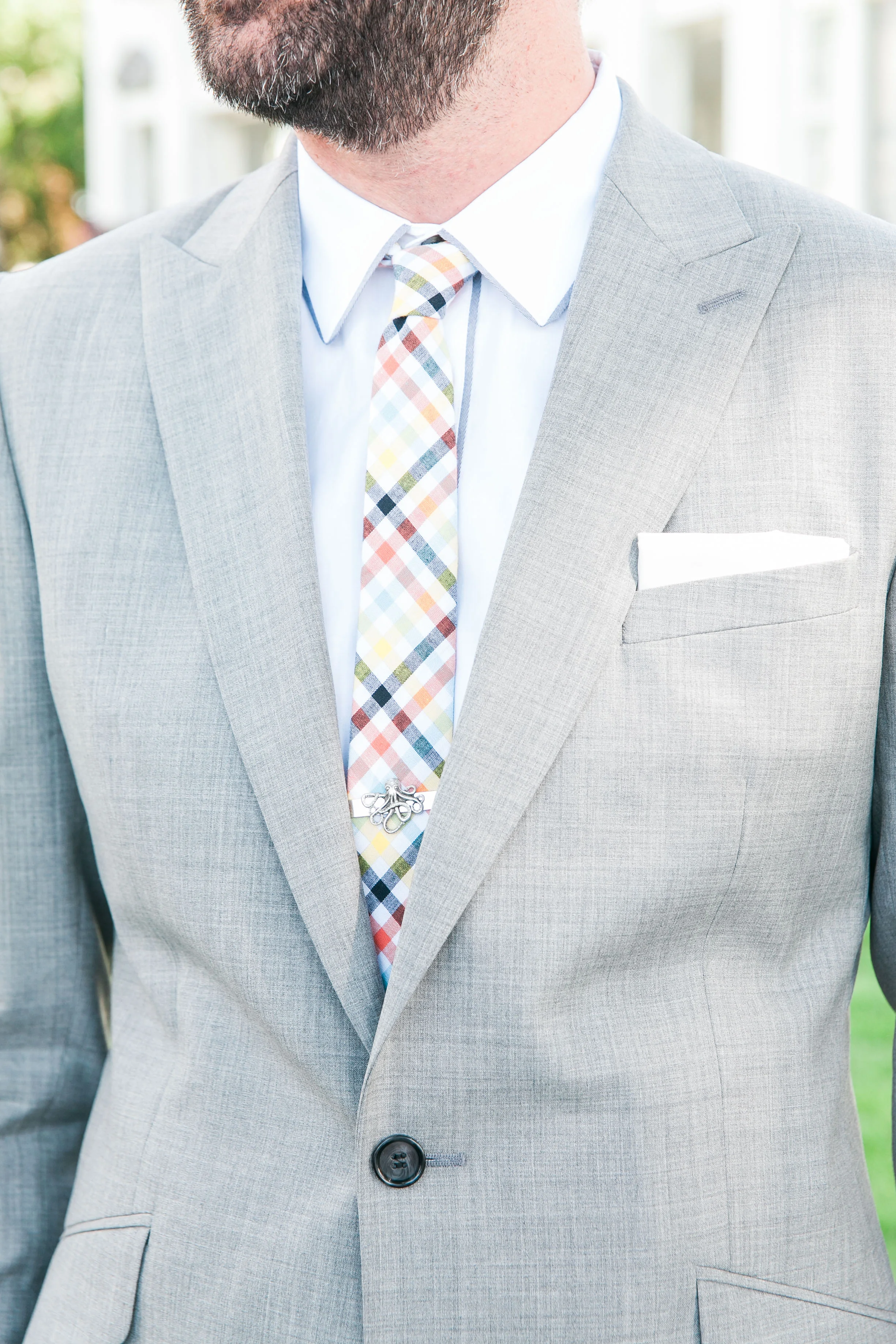 Detail photo of guests outfit at summer wedding