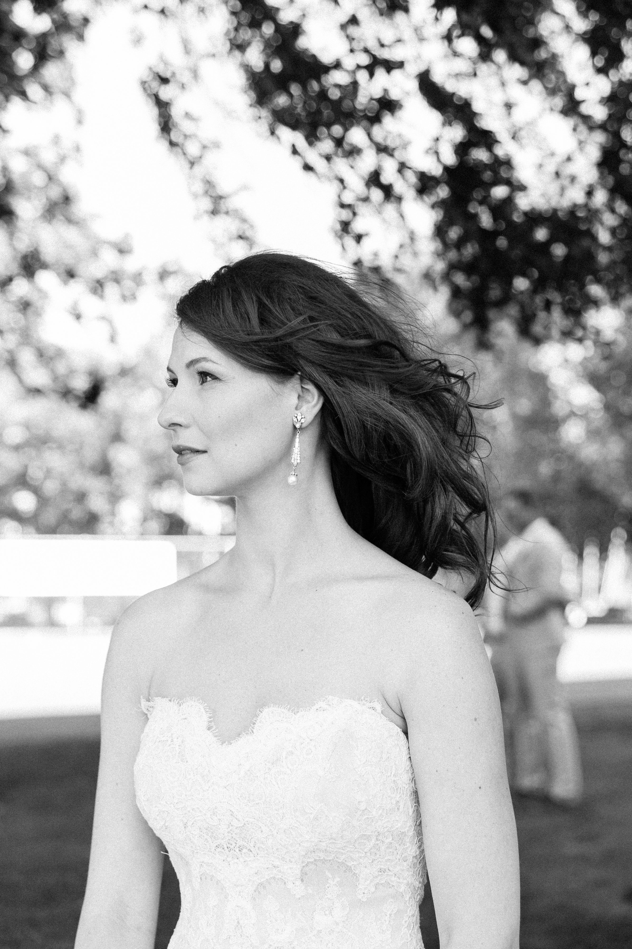 Black and white photos of a bride outside