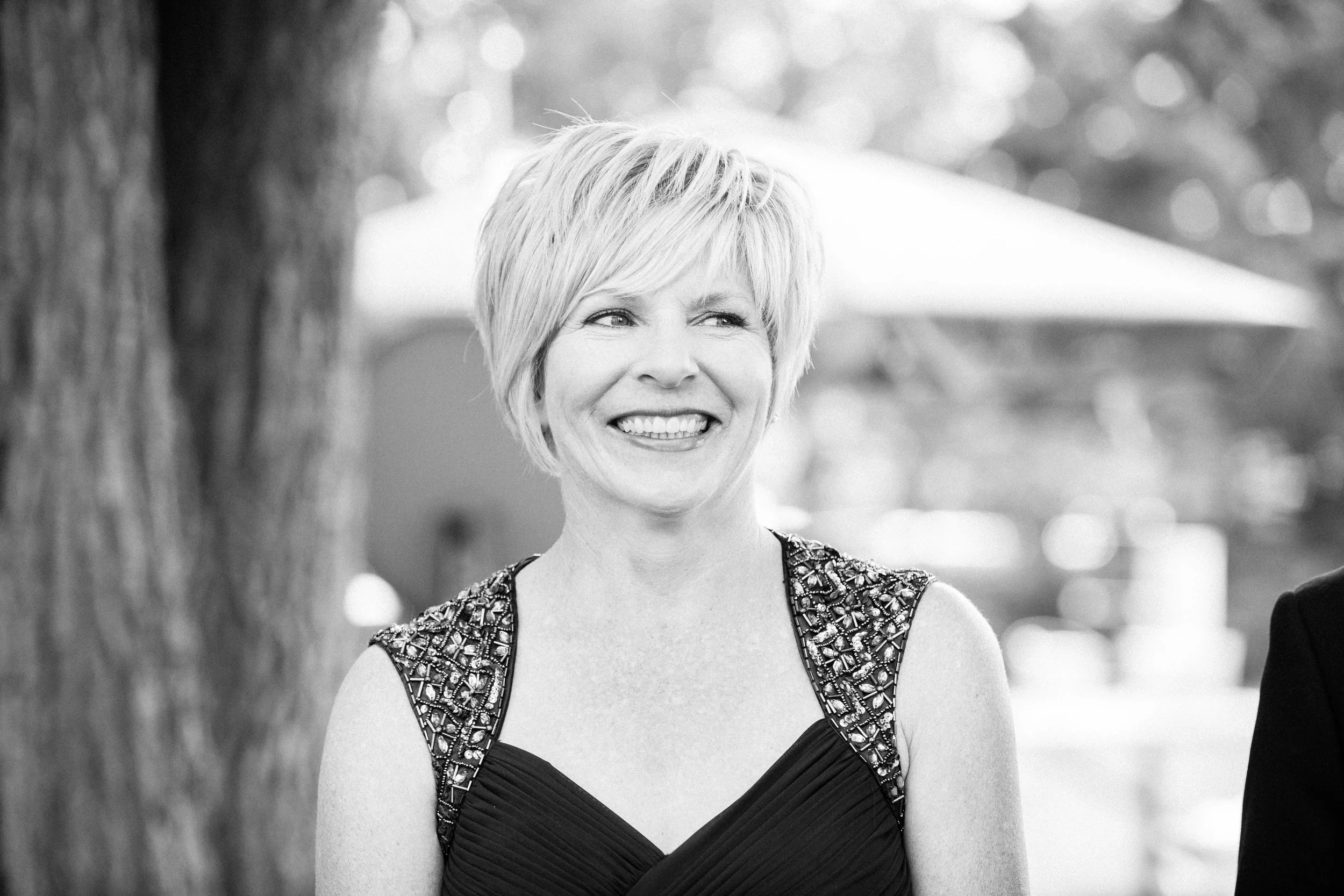 Mother of the groom smiling at Ontario wedding