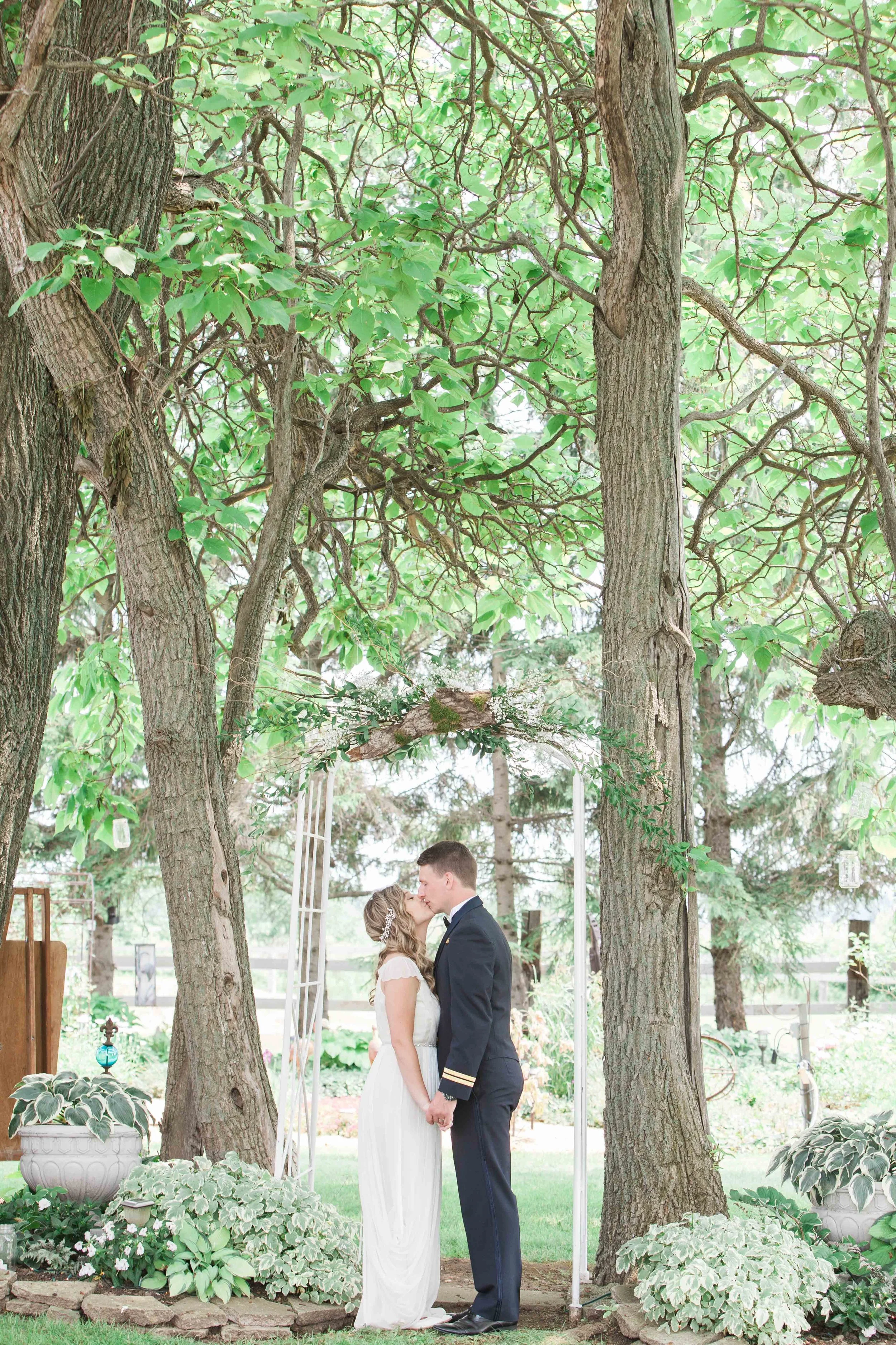 Bride and groom photos at intimate summer wedding
