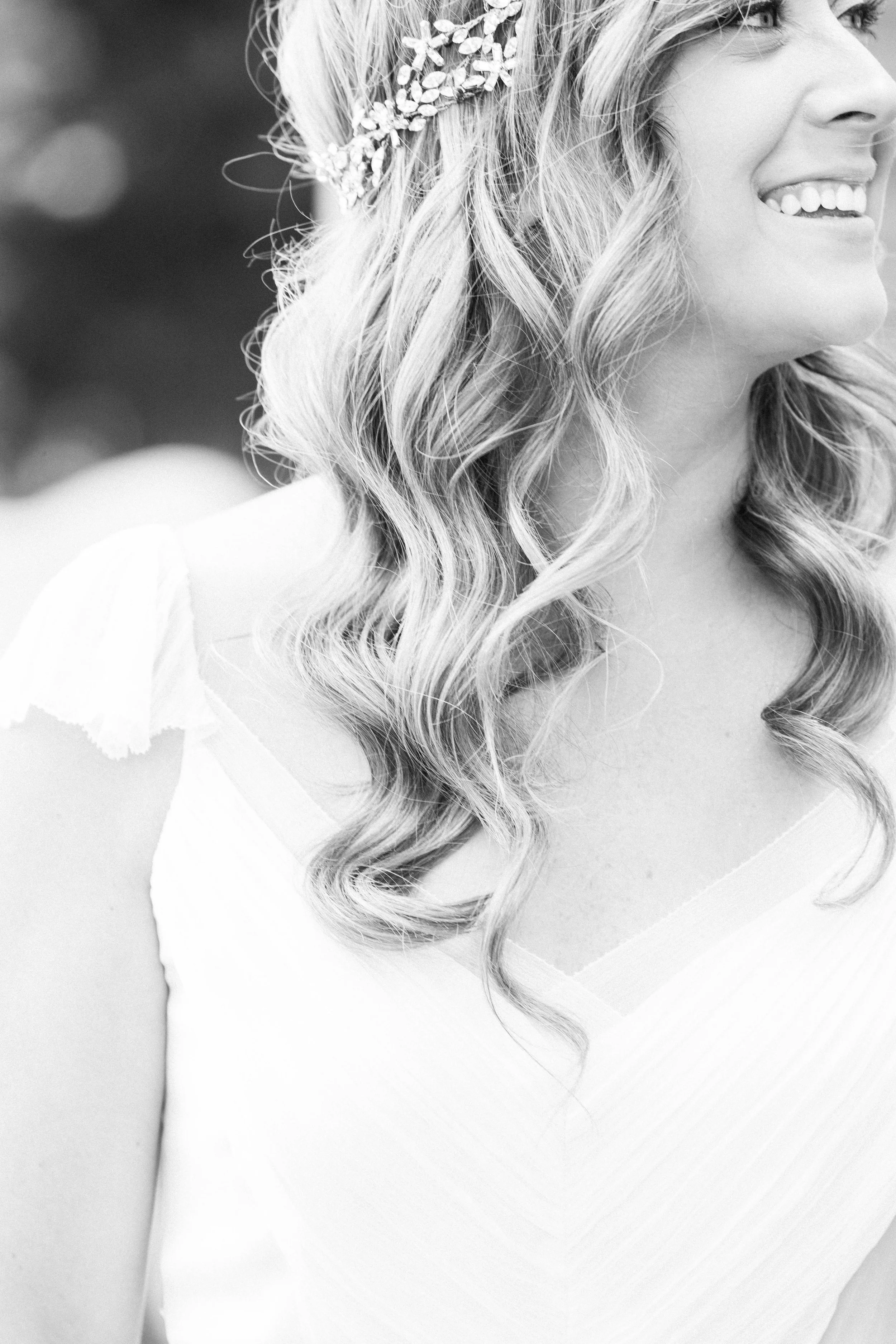 Bride wearing crystal headband with wavy hair