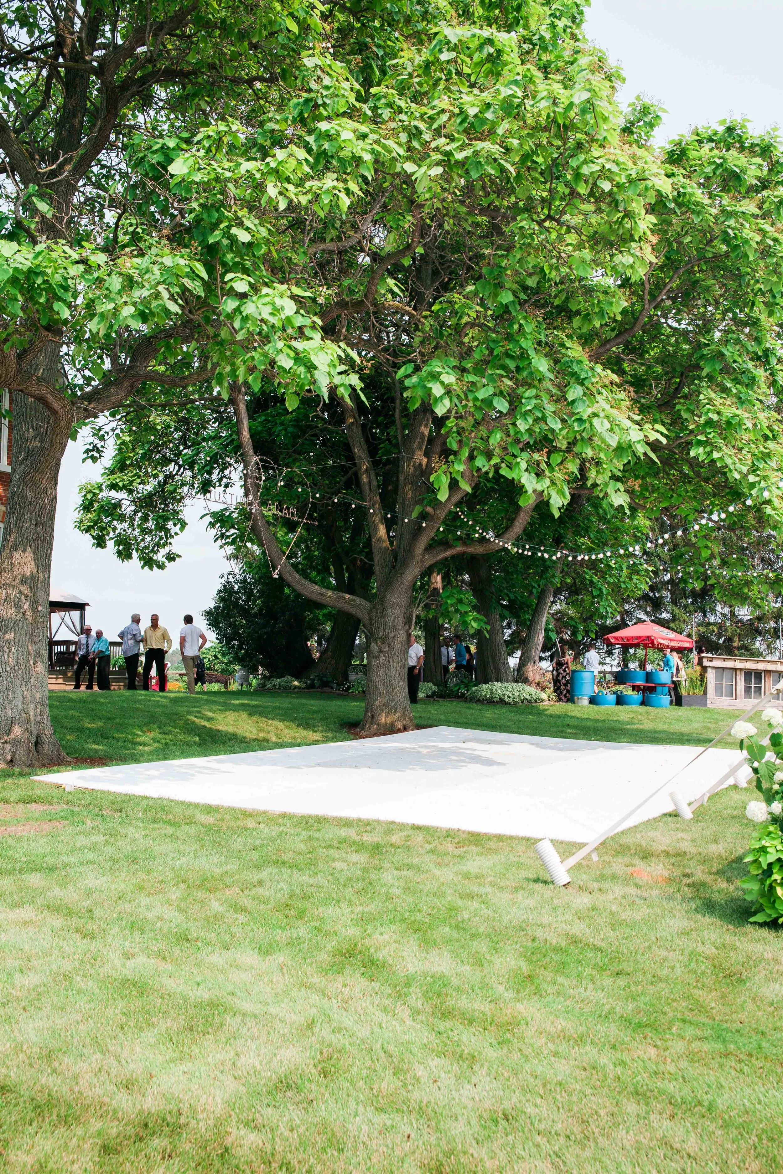 Dance floor under the stars at country wedding
