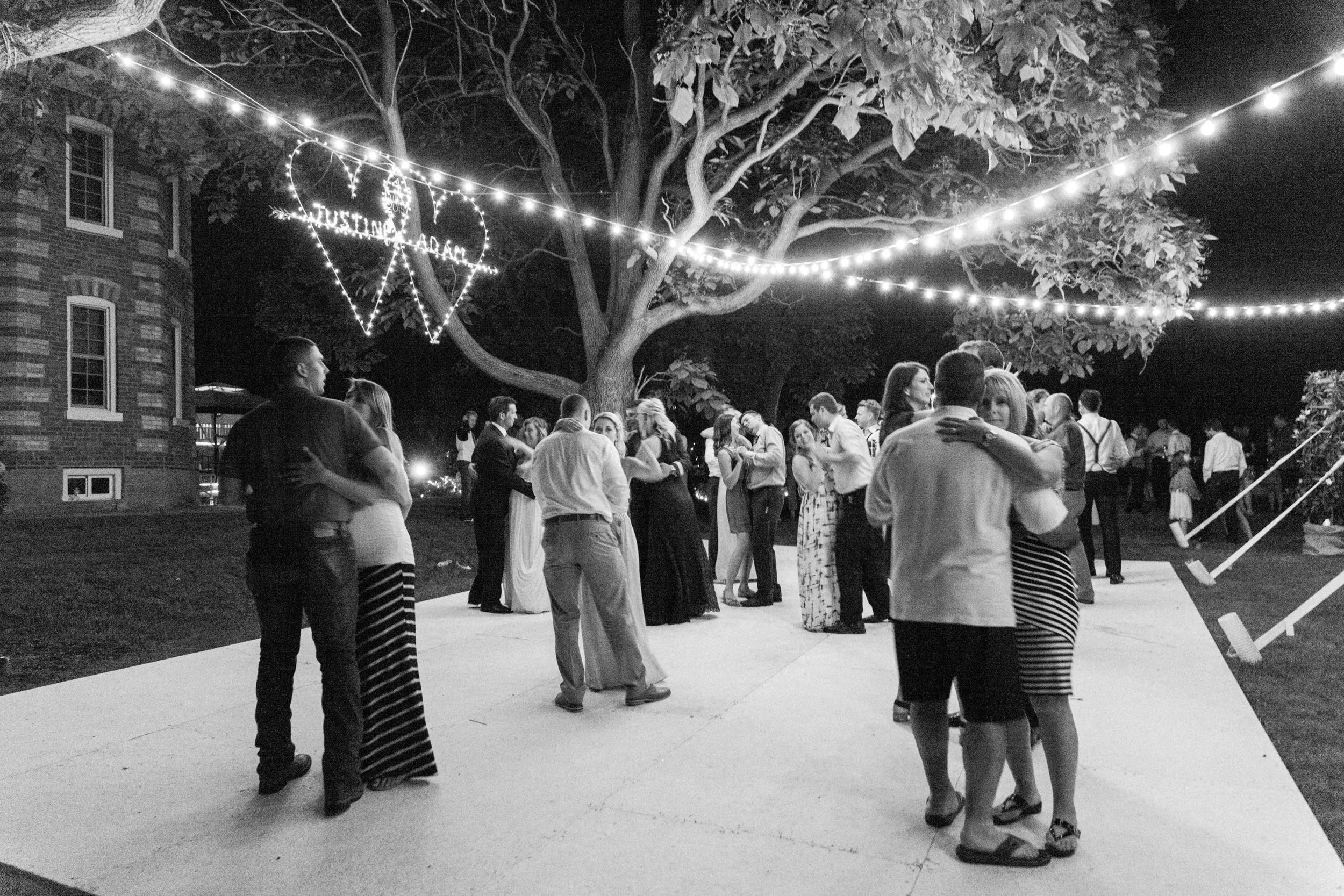 Guest dancing under the stars at Ontario farm wedding
