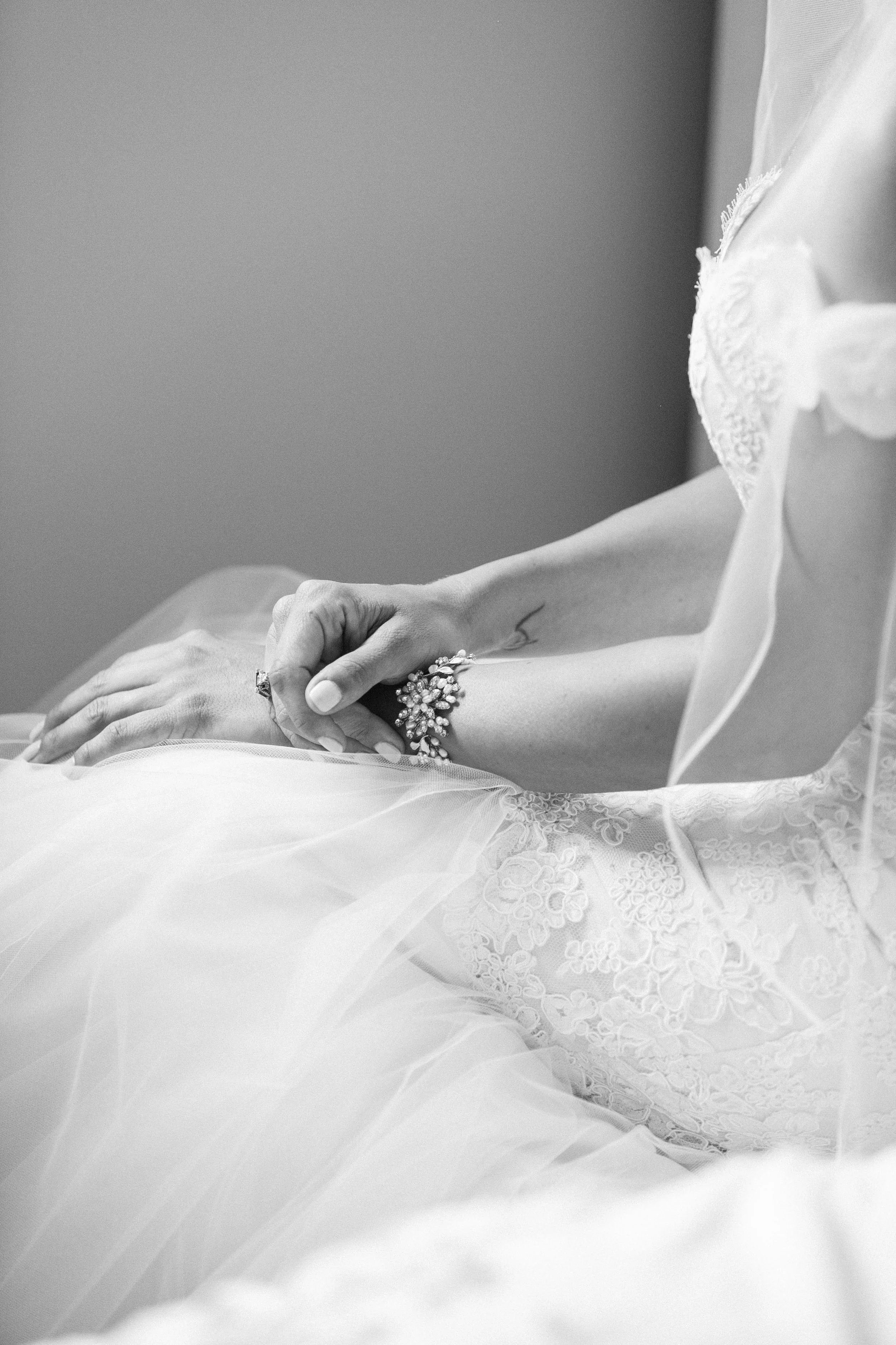 Bride wearing custom bracelet and ring
