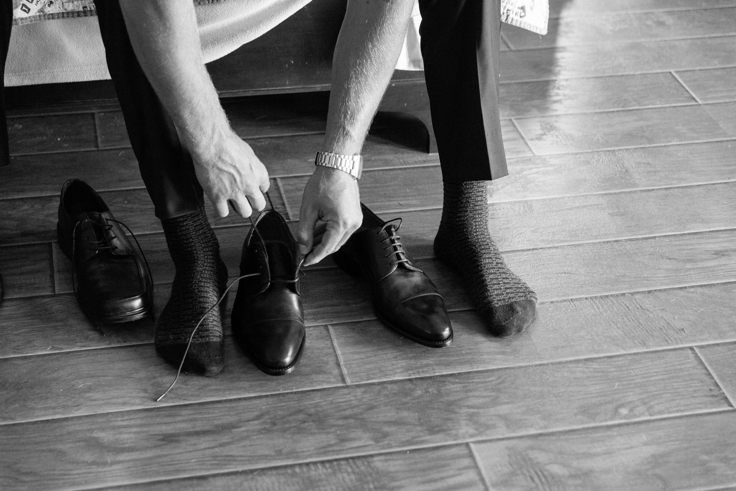 Groom getting ready for wedding in Muskoka