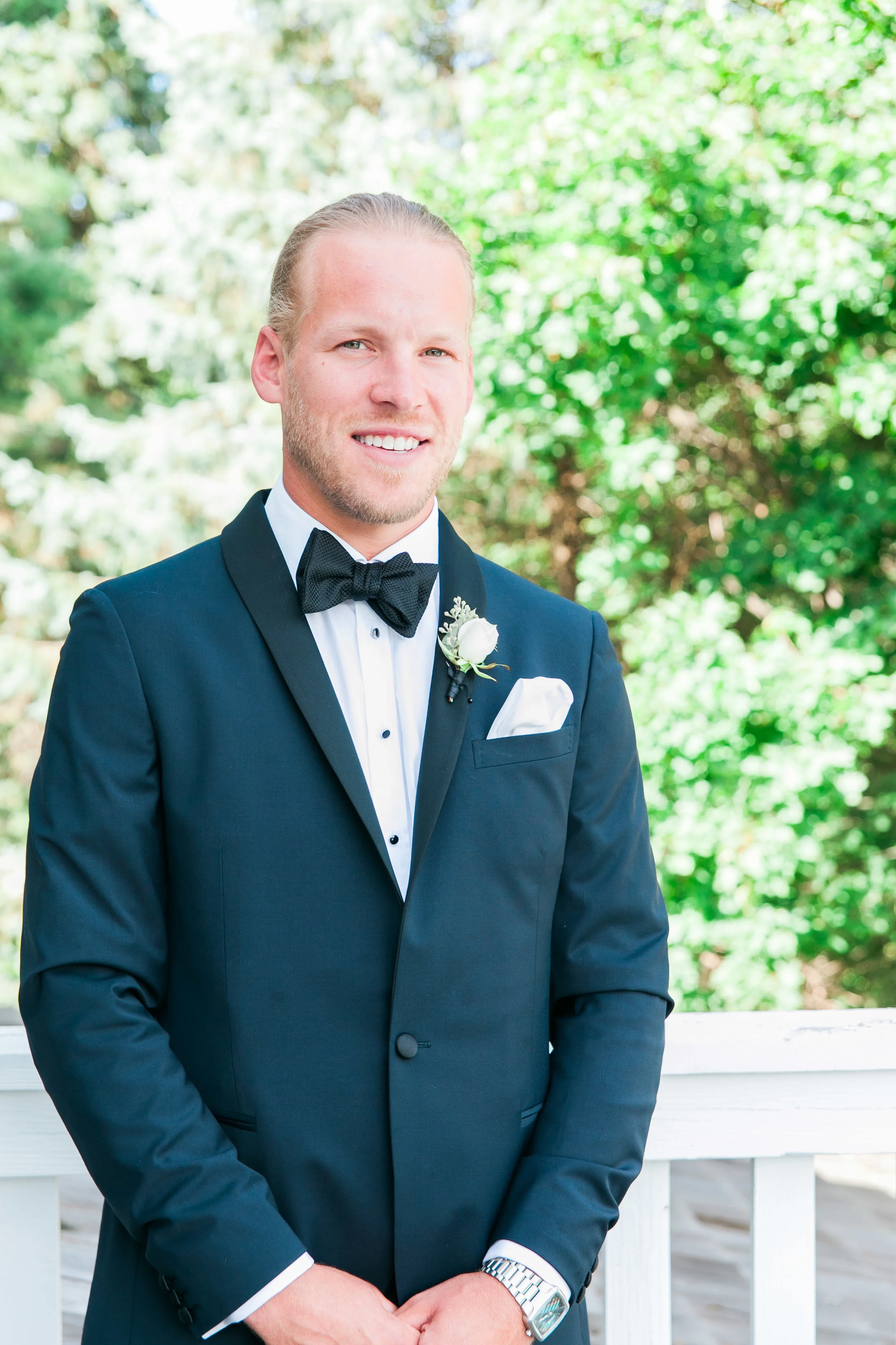 Outdoor portrait of groom in Muskoka